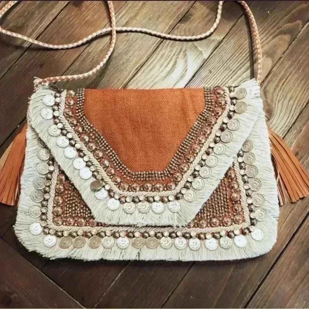 SHASHI Leela Clutch In
Monochrome REVOLVE